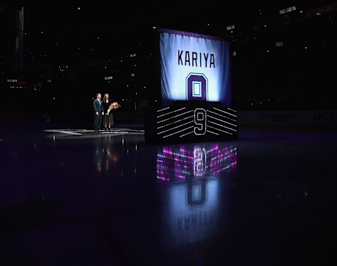 ANAHEIM, CA – OCTOBER 21: Paul Kariya #9 of the Anaheim Ducks and girlfriend Valerie Dawson watch during his jersey retirement ceremony at Honda Center on October 21, 2018, in Anaheim, California. (Photo by Harry How/Getty Images)