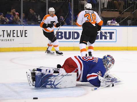 NEW YORK, NEW YORK – MARCH 01: Michael Raffl #12 of the Philadelphia Flyers celebrates his short-handed goal at 17:53 of the first period against Henrik Lundqvist #30 of the New York Rangers and is joined by Derek Grant #38 at Madison Square Garden on March 01, 2020 in New York City. The Flyers defeated the Rangers 5-3. (Photo by Bruce Bennett/Getty Images)