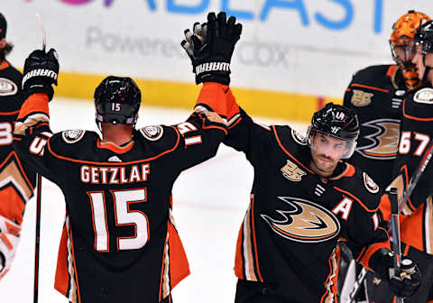 ANAHEIM, CA – NOVEMBER 07: Anaheim Ducks center Adan Henrique (14) high fives Captain Ryan Getzlaf (15) after the Ducks defeated the Calgary Flames 3 to 2 in a game played on November 7, 2018, at the Honda Center in Anaheim, CA. (Photo by John Cordes/Icon Sportswire via Getty Images)