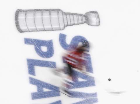 The New Jersey Devils skate in warm-ups (Photo by Bruce Bennett/Getty Images)