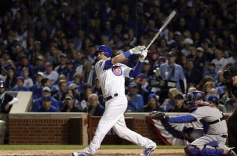 Oct 22, 2016; Chicago, IL, USA; Chicago Cubs catcher Willson Contreras (40) hits a solo home run against the Los Angeles Dodgers during the fourth inning of game six of the 2016 NLCS playoff baseball series at Wrigley Field. Mandatory Credit: Jon Durr-USA TODAY Sports