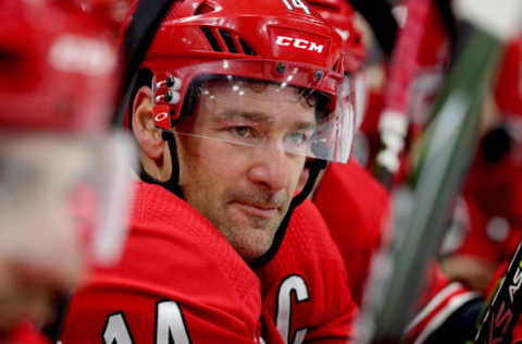 RALEIGH, NC – DECEMBER 31: Justin Williams #14 of the Carolina Hurricanes watches action on the ice during his 1200th NHL game against the Philadelphia Flyers on December 31, 2018 at PNC Arena in Raleigh, North Carolina. (Photo by Gregg Forwerck/NHLI via Getty Images)