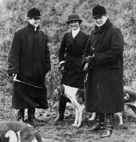 Winston Churchill (right) is accompanied by his son, Randolph, and Coco Chanel at a meet of the Duke of Westminster's boar hounds in northern France, circa 1928.