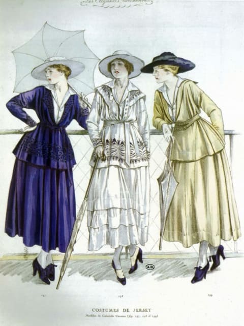 Illustration published in 'Les Elegances Parisiennes,' showing three women in day outfits by "Gabrielle Channel" (sic) consisting of belted tunic jackets and full jersey skirts; March 1917.