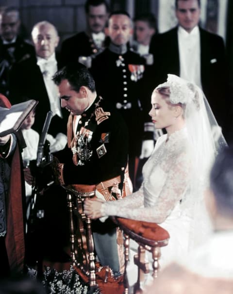 U.S. actress Grace Kelly and Prince Rainier of Monaco during their wedding ceremony in Monaco.