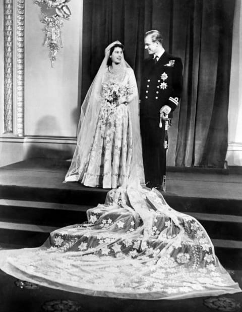 The Princess Elizabeth of England and Philip The Duke of Edinburgh pose on their wedding day in November 1947 in Buckingham Palace.