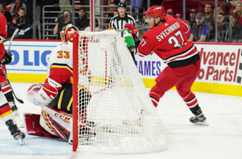 RALEIGH, NC – OCTOBER 29: Carolina Hurricanes Left Wing Andrei Svechnikov (37) scores a lacrosse style goal during a game between the Calgary Flames and the Carolina Hurricanes at the PNC Arena in Raleigh, NC on October 29, 2019. (Photo by Greg Thompson/Icon Sportswire via Getty Images)