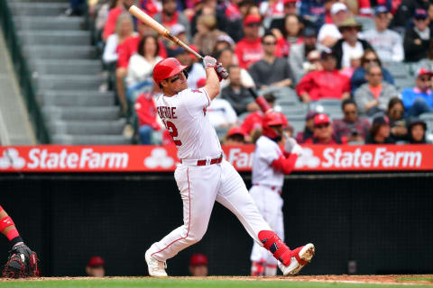 Apr 12, 2023; Anaheim, California, USA; Los Angeles Angels right fielder Hunter Renfroe (12) hits a double against the Washington Nationals during the fifth inning at Angel Stadium. Mandatory Credit: Gary A. Vasquez-USA TODAY Sports