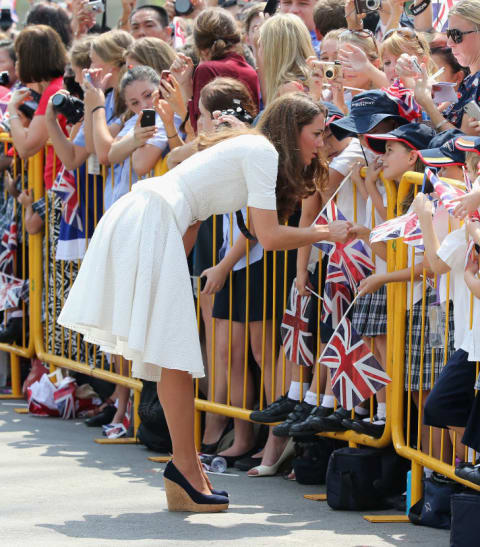 Catherine, Duchess of Cambridge wears wedges while on a tour in Singapore in 2012.