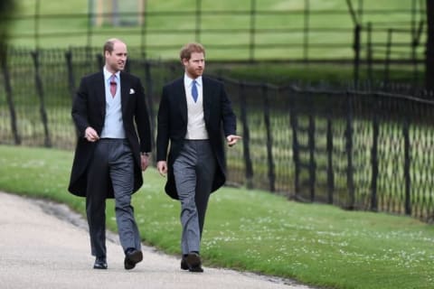 Britain's Prince Harry (R) and Britain's Prince William, Duke of Cambridge walk to the church for the wedding of Pippa Middleton and James Matthews at St Mark's Church in Englefield, west of London, on May 20, 2017