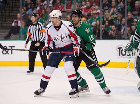 Jan 21, 2017; Dallas, TX, USA; Washington Capitals right wing Justin Williams (14) and Dallas Stars defenseman Patrik Nemeth (15) in action during the game at the American Airlines Center. The Capitals defeat the Stars 4-3 in overtime. Mandatory Credit: Jerome Miron-USA TODAY Sports