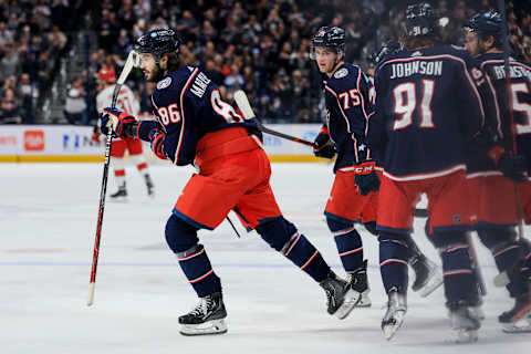 Jan 7, 2023; Columbus, Ohio, USA; Columbus Blue Jackets right wing Kirill Marchenko (86) celebrates with teammates after scoring a goal against the Carolina Hurricanes in the second period at Nationwide Arena. Mandatory Credit: Aaron Doster-USA TODAY Sports