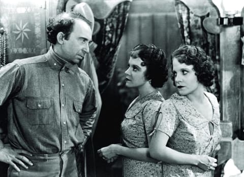 Roscoe Ates, Daisy Hilton, and Violet Hilton in Freaks (1932)