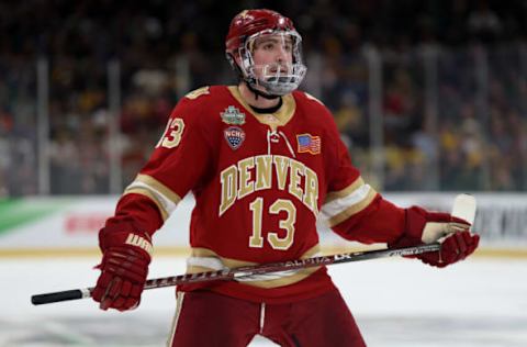 BOSTON, MASSACHUSETTS – APRIL 07: Massimo Rizzo #13 of the Denver looks on during the first period of the Frozen Four semifinal game between the Michigan Wolverines and Denver Pioneers at TD Garden on April 07, 2022, in Boston, Massachusetts. (Photo by Maddie Meyer/Getty Images)