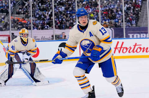 Mar 13, 2022; Hamilton, Ontario, CAN; Buffalo Sabres defenseman Mark Pysyk (13) skates against the Toronto Maple Leafs during the third period in the 2022 Heritage Classic ice hockey game at Tim Hortons Field. Mandatory Credit: John E. Sokolowski-USA TODAY Sports