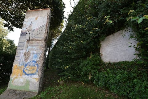 A piece of the Berlin wall in the Vatican gardens in 2014