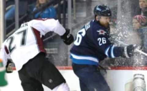 Blake Wheeler takes an unnecessary blow – Bruce Fedyck-USA TODAY Sports