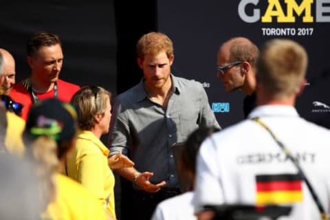 Prince Harry talks to representatives at the Invictus Games