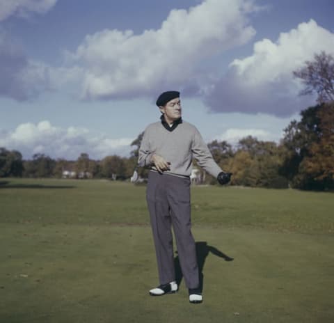 Bob Hope playing golf in England, circa 1965.