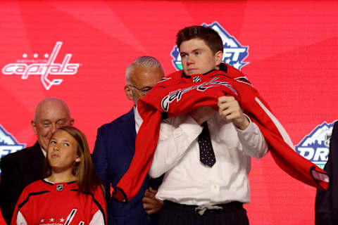 VANCOUVER, BRITISH COLUMBIA – JUNE 21: Connor Mcmichael reacts after being selected twenty-fifth overall by the Washington Capitals during the first round of the 2019 NHL Draft at Rogers Arena on June 21, 2019 in Vancouver, Canada. (Photo by Bruce Bennett/Getty Images)