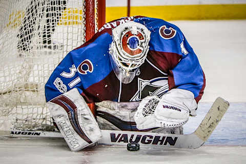 DENVER, CO – JANUARY 25: Colorado Avalanche Goalie Calvin Pickard (31) covers the puck after making save during the Vancouver Canucks and Colorado Avalanche NHL game on January 25, 2017, at Pepsi Center in Denver, CO. (Photo by John Crouch/Icon Sportswire via Getty Images)