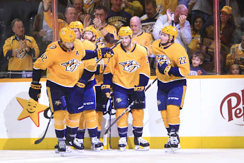 NASHVILLE, TN – OCTOBER 30: Nashville Predators center Ryan Johansen (92), defenseman Roman Josi (59), defenseman Ryan Ellis (4) and left wing Kevin Fiala (22) celebrate a second period goal by Nashville Predators winger Ryan Hartman (38) during the NHL game between the Nashville Predators and the Vegas Golden Knights, held on October 30, 2018, at Bridgestone Arena in Nashville, Tennessee. (Photo by Danny Murphy/Icon Sportswire via Getty Images)