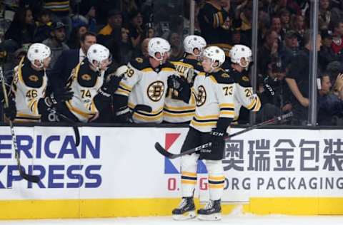 LOS ANGELES, CA – NOVEMBER 16: Boston Bruins defenceman Charlie McAvoy (73) gets congratulated after scoring a goal against the Los Angeles Kings on November 16, 2017, at the Staples Center in Los Angeles, CA. (Photo by Adam Davis/Icon Sportswire via Getty Images)