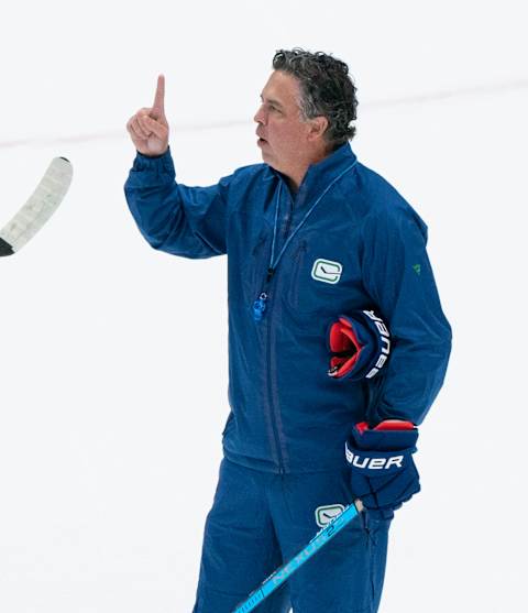 VANCOUVER, BC – JANUARY 4: Head coach Travis Green gestures while shouting instructions to the team on the first day of the Vancouver Canucks NHL Training Camp at Rogers Arena on January 4, 2021 in Vancouver, British Columbia, Canada. (Photo by Rich Lam/Getty Images)