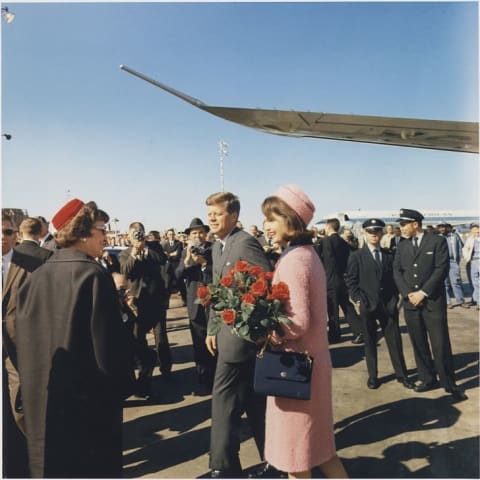 President John F. Kennedy and Jackie Kennedy arriving at Dallas in 1963