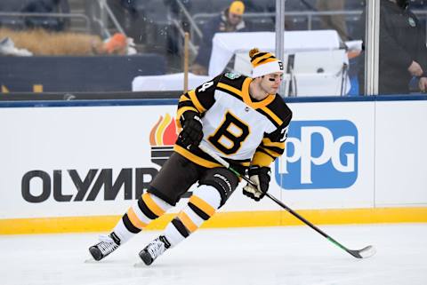 SOUTH BEND, IN – JANUARY 01: Jake DeBrusk #74 of the Boston Bruins warms up prior to the 2019 Bridgestone NHL Winter Classic at Notre Dame Stadium on January 1, 2019 in South Bend, Indiana. (Photo by Brian Babineau/NHLI via Getty Images)