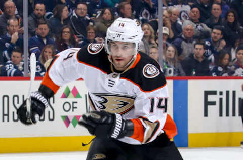 WINNIPEG, MB – MARCH 23: Adam Henrique #14 of the Anaheim Ducks follows the play down the ice during the first-period action against the Winnipeg Jets at the Bell MTS Place on March 23, 2018, in Winnipeg, Manitoba, Canada. The Jets defeated the Ducks 3-2 in overtime. (Photo by Jonathan Kozub/NHLI via Getty Images)