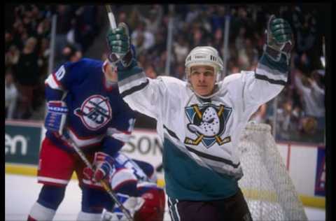 27 Jan 1995: Leftwinger Paul Kariya of the Anaheim Mighty Ducks celebrates after scoring against the Winnipeg Jets during a game at Arrowhead Pond in Anaheim, California. The Ducks won the game, 3-2.