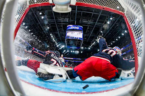 TAMPERE, FINLAND – NOVEMBER 05: goalkeeper Joonas Korpisalo of Columbus (R) and Nick Blankenburg of Columbus in action on Artturi Lehkonen of Colarado goal during the 2022 NHL Global Series – Finland match between Colorado Avalanche and Columbus Blue Jackets at Nokia Arena on November 5, 2022 in Tampere, Finland. (Photo by Jari Pestelacci/Eurasia Sport Images/Getty Images)