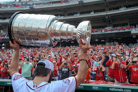 WASHINGTON, DC – JUNE 09: Washington Capitals captain, Alex Ovechkin walks off the field with the Stanley Cup held over his head prior to the game between the San Fransisco Giants and the Washington Nationals on June 9, 2018, at Nationals Park, in Washington D.C. (Photo by Mark Goldman/Icon Sportswire via Getty Images)