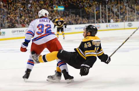 BOSTON, MA – MAY 25: Michael Haley #32 of the New York Rangers checks Matt Bartowski #43 of the Boston Bruins in Game Five of the Eastern Conference Semifinals during the 2013 NHL Stanley Cup Playoffs at TD Garden on May 25, 2013 in Boston, Massachusetts. (Photo by Brian Babineau/NHLI via Getty Images)