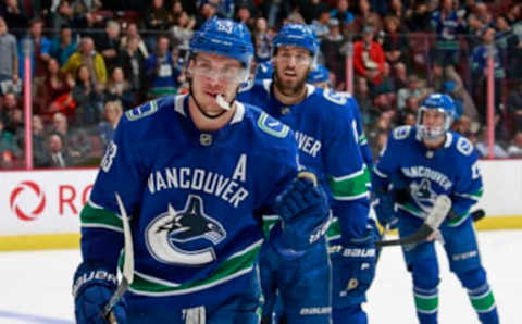 VANCOUVER, BC – FEBRUARY 25: Bo Horvat #53 of the Vancouver Canucks is congratulated by teammates after scoring during their NHL game against the Anaheim Ducks at Rogers Arena February 25, 2019 in Vancouver, British Columbia, Canada. (Photo by Jeff Vinnick/NHLI via Getty Images)