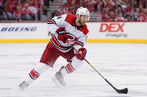 WASHINGTON, DC – APRIL 20: Jaccob Slavin #74 of the Carolina Hurricanes skates with the puck in the first period against the Washington Capitals in Game Five of the Eastern Conference First Round during the 2019 NHL Stanley Cup Playoffs at Capital One Arena on April 20, 2019 in Washington, DC. (Photo by Patrick McDermott/NHLI via Getty Images)