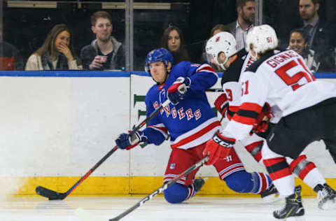 NEW YORK, NY – MARCH 09: New York Rangers Center Ryan Strome (16) fires a pass from his knees during the National Hockey League game between the New Jersey Devils and the New York Rangers on March 9, 2019 at Madison Square Garden in New York, NY. (Photo by Joshua Sarner/Icon Sportswire via Getty Images)