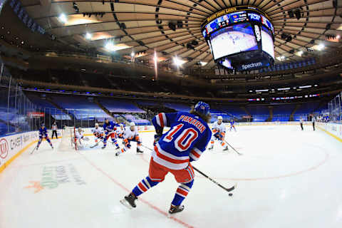 New York Rangers left wing Artemi Panarin (10) plays the puck Credit: Bruce Bennett/Pool Photo via USA TODAY Sports