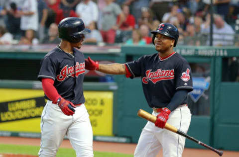 CLEVELAND, OH – JULY 11: Cleveland Indians shortstop Francisco Lindor (12) is congratulated by Cleveland Indians third baseman Jose Ramirez (11) after hitting a 3-run home run during the fourth inning of the Major League Baseball Interleague game between the Cincinnati Reds and Cleveland Indians on July 11, 2018, at Progressive Field in Cleveland, OH. (Photo by Frank Jansky/Icon Sportswire via Getty Images)