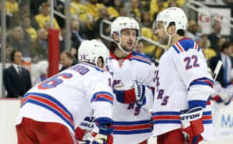 Apr 13, 2016; Pittsburgh, PA, USA; New York Rangers center Derick Brassard (16) and right wing Mats Zuccarello (36) and defenseman Dan Boyle (22) talk before a face-off against the Pittsburgh Penguins during the third period in game one of the first round of the 2016 Stanley Cup Playoffs at the CONSOL Energy Center. The Penguins won 5-2. Mandatory Credit: Charles LeClaire-USA TODAY Sports