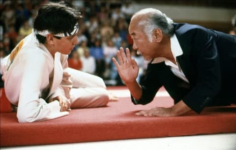 Ralph Macchio and Pat Morita in The Karate Kid (1984).