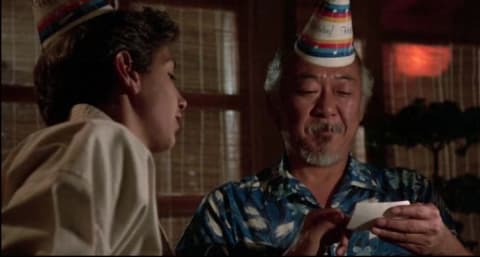 Ralph Macchio and Pat Morita in The Karate Kid (1984).