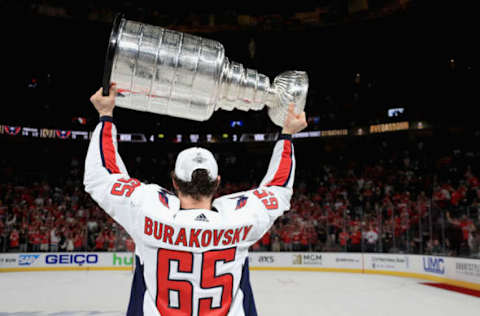 LAS VEGAS, NV – JUNE 07: Andre Burakovsky #65 of the Washington Capitals lifts the Stanley Cup in celebration after Game Five of the 2018 NHL Stanley Cup Final. (Photo by Dave Sandford/NHLI via Getty Images)