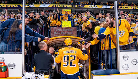 NASHVILLE, TN – FEBRUARY 7: Fans congratulate Ryan Johansen #92 of the Nashville Predators on his overtime game winning goal against the Dallas Stars at Bridgestone Arena on February 7, 2019 in Nashville, Tennessee. (Photo by John Russell/NHLI via Getty Images)