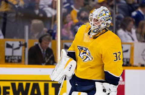 Kevin Lankinen #32 of the Nashville Predators waits for play to begin against the Toronto Maple Leafs during the second period at Bridgestone Arena on March 26, 2023 in Nashville, Tennessee. (Photo by Brett Carlsen/Getty Images)