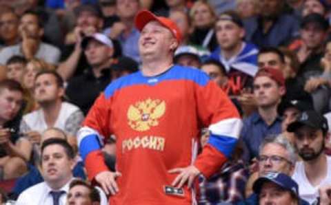 Sep 19, 2016; Toronto, Ontario, Canada; A fan of Team Russia smiles as he watches a goal for his team against Team North America during preliminary round play in the 2016 World Cup of Hockey Mandatory Credit: Dan Hamilton-USA TODAY Sports