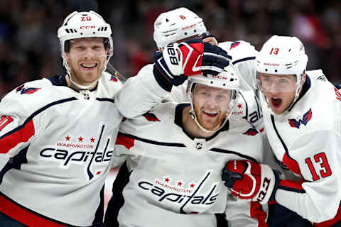 DENVER, COLORADO – FEBRUARY 13: Lars Eller #20, Nick Jensen #3, Alex Ovechkin #8 and Jakub Vrana #13 of the Washington Capitals celebrate the go ahead goal by T.J. Oshie #77 against the Colorado Avalanche in the third period at the Pepsi Center on February 13, 2020 in Denver, Colorado. (Photo by Matthew Stockman/Getty Images)