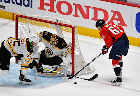 May 17, 2021; Washington, District of Columbia, USA; Boston Bruins goaltender Tuukka Rask (40) makes a save on the shot by Washington Capitals left wing Carl Hagelin (62) during the second period in game two of the first round of the 2021 Stanley Cup Playoffs at Capital One Arena. Mandatory Credit: Brad Mills-USA TODAY Sports