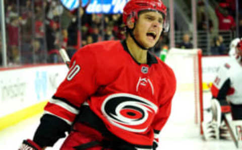 RALEIGH, NC – NOVEMBER 11: Sebastian Aho #20 of the Carolina Hurricanes celebrates scoring a short handed goal during an NHL game against the Ottawa Senators on November 11, 2019 at PNC Arena in Raleigh, North Carolina. (Photo by Gregg Forwerck/NHLI via Getty Images)